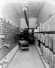 Interior of plate vault. Roll case on left, engraved plates on right ca. between 1909 and 1932