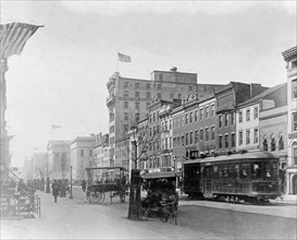 Trolley car traveling down F Street, between 6th & 7th, N.W., Washington, D.C. ca. [between 1909 and 1920]
