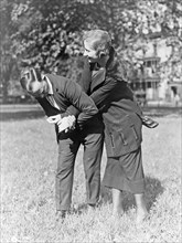 Policewoman and policeman practicing self-defense ca. 1909
