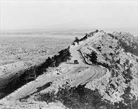 Car on road along ridge in Estes National Park, Colorado, i.e. Rocky Mountain National Park ca. 1909 (before being officially established in 1915)