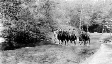 Horseback riders in stream in Rock Creek Park, Washington, D.C. ca. 1909