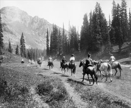 Horseback riders on the trail of Indian Henry's, Mt. Rainier National Park, Washington ca. 1909