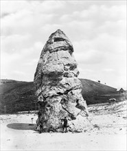 Liberty Cap at Mammoth Hot Springs, Yellowstone National Park, Wyoming, reached by the Northern Pacific Railway via Gardiner Gateway ca. 1909