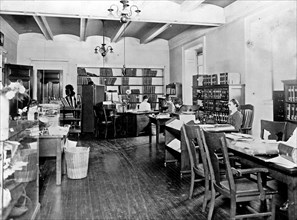 Reading room for the blind in the Library of Congress. Several employees of this division are blind ca. 1909