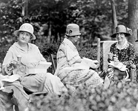Left to right: Mrs. William N. Butler, wife of the Senator from Mass., Mrs. Frederick Gillett, wife of the Senator from Mass., and Mrs. Oscar Underwood, wife of the Senator from Alabama, at the weekly...