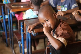 A smiling school student, a school boy, in Darsalam School in Bamako Mali  ca. 10 May 2017