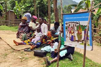 Women in the Bulambira community Uganda listen to a Family Life School community group meeting (Rubanda District) ca. 14 March 2018