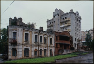 Shabarova house (Frunze Street, around 1900), with 1990s apartment building in background, Khabarovsk, Russia; 2000