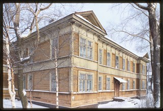 Wooden (log) apartment house, Dvina River embankment (1990s), Arkhangelsk, Russia 1999.