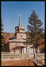 Log Church of Saint Nicholas (1846), west view which was originally built near the site where Lake Baikal drains into the Angara River, Listvianka, Russia; 1999