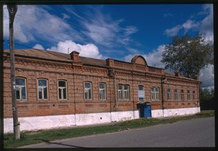 Brick commercial building, Sacco and Vanzetti Street #1 (late 19th century), Tobol'sk, Russia 1999.