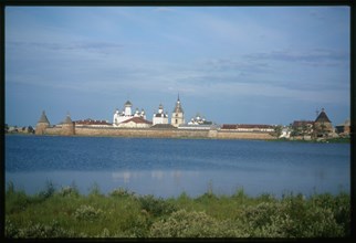 Monastery of the Transfiguration of the Savior (16th-19th centuries), northeast view across Holy Lake, with White Tower (left), Arkhangelsk Tower, and St. Nicholas Tower (right), Solovetskii Island, R...