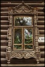 Log house, Nikitin Street #15 (at corner of Belinskii Street), (early 20th century), window on Belinskii Street facade, Tomsk, Russia; 1999