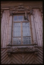 Log house, Dzerzhinskii Street #43 (20th century), carved window frame, Tiumen, Russia 1999.
