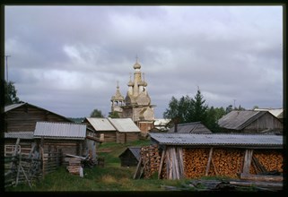 Church of the Hodigitria Icon of the Virgin (1763), southeast panorama with village houses, Kimzha, Russia; 2000