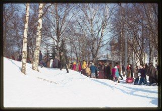Maslennitsa festival procession, Cathedral park, Vologda, Russia 2000.