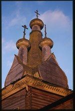 Church of the Hodigitria Icon of the Virgin (1763), northwest view, wooden domes, Kimzha, Russia; 2000