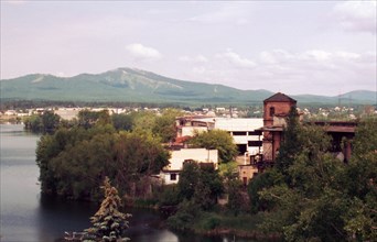 Upper Kyshtym Pond and Factory, view toward Mount Sugomak, Kyshtym, Russia; 2003