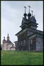 Log Church of St. George (1665), and Church of Resurrection (1752), southeast view, Permogor'e, Russia; 2000