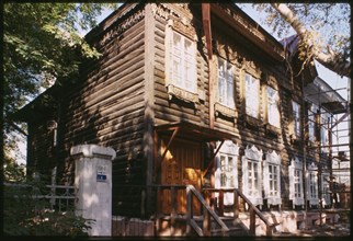 Log house, Chaplygin Street #65 (1904-14), which housed the city's first professional union, the Novonikolaevsk Society of Clerks, Novosibirsk, Russia 1999.