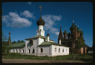 Church of the Tikhvin Icon of the Mother of God (1686-1690s), southeast view, whose red brick walls have been repainted white in a recent restoration, with Church of Saint Nicholas Mokryi (1665-72), i...