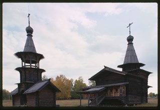 Log Church of the Savior and bell tower from the village of Zashiversk (1700), southwest view, moved and reassembled in the Outdoor Architecture and History Museum at Akademgorodok, Russia 1999.