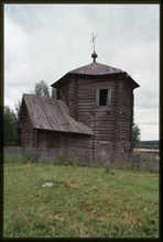 Log Church of the Epiphany (also known as Nativity of the Virgin, oldest wooden structure in the Urals, 1617), southwest view, Pianteg, Russia; 2000