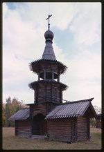 Log Church of the Savior from the village of Zashiversk (1700), bell tower, northeast view, moved and reassembled in the Outdoor Architecture and History Museum at Akademgorodok, Russia 1999.