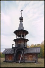 Log Church of the Savior from the village of Zashiversk (1700), bell tower, east facade, moved and reassembled in the Outdoor Architecture and History Museum at Akademgorodok, Russia 1999.
