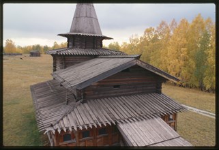 Log Church of the Savior from the village of Zashiversk (1700), west view from bell tower, moved and reassembled in the Outdoor Architecture and History Museum at Akademgorodok, Russia 1999.