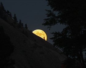 Moon rise over Mt. Everts near Mammoth Hot Springs in Yellowstone National Park; Date: 3 July 2012