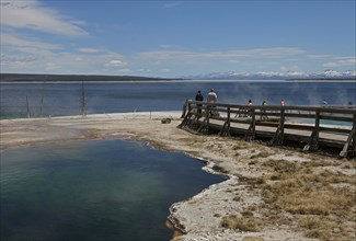 Visitors and Abyss Pool at West Thumb Geyser Basin in Yellowstone National Park; Date: 15 May 2013