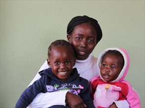 TB patient in Mutare, Zimbabwe (a mother and her children) ca. 23 August 2013