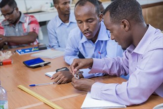 A man receives teacher training in Mogadishu and Garowe via the "Somali Youth Learners Initiative (SYLI)" ca. 11 June 2015