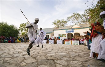 Men dancing with a spear in Garowe Puntland ca. 1 June 2015