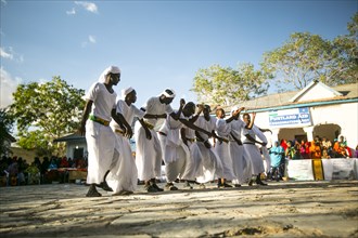 Muslim men dancing at a ceremony in Garowe, Puntland ca. 3 June 2015