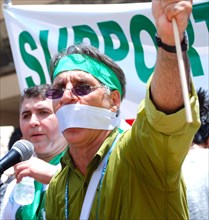 Iranians in Texas taking part in a Freedom for Iran / Green Revolution rally at Dallas City Hall plaza in downtown Dallas, TX ca. June 2009