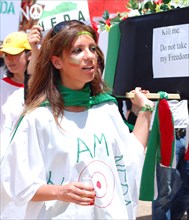 Iranians in Texas taking part in a Freedom for Iran / Green Revolution rally at Dallas City Hall plaza in downtown Dallas, TX ca. June 2009