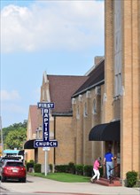 Church members entering the First Baptist Church in downtown Sulphur Springs, TX
