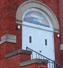 Close up of the doors of the Methodist church in Hindsboro, IL