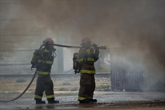 Firefighters on the scene of a truck fire in Guymon, Oklahoma
