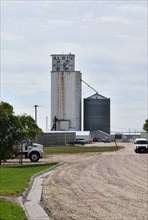 Grain elevator in the small town of Albin, Wyoming (cattle hauler trailer in the foreground)