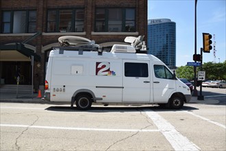 Dallas, Texas, USA. 8th July, 2016. Out of town news trucks and vans can be seen all around downtown Dallas the day after five police officers were shot down by a sniper