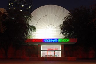 Night photo of the Dallas Museum of Art side entrance in Dallas, TX