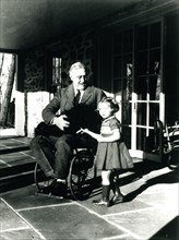 President Franklin D. Roosevelt with his dog Fala and Ruthie Bie