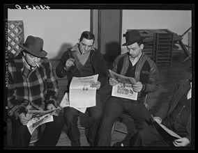 Union members reading 'Steel Labor'
