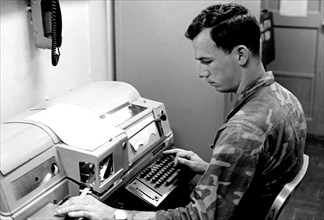 A Marine teletype operator