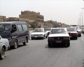 A typical traffic scene on a Baghdad street, during Operation Iraqi Freedom