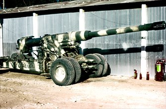 A right front view of a Soviet built S.23 180 mm gun.