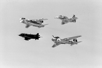 Ground-to-air view of four aircrafts